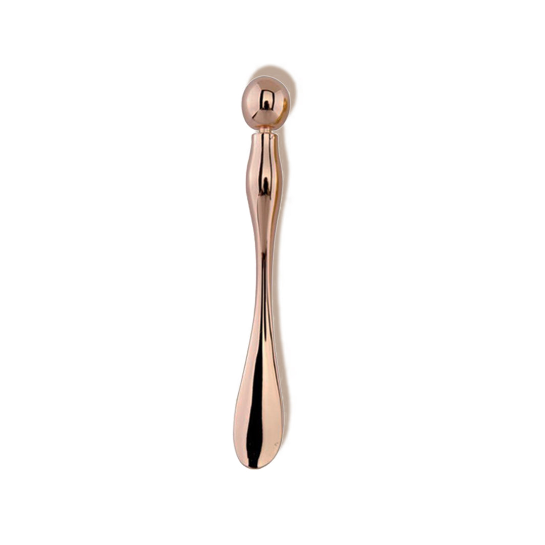 Abaci Dual-Ended Applicator & Acupressure Beauty Tool in Rose Gold. One end to scoop lip balm and the other end for facial massage. Made of high quality zinc alloy.